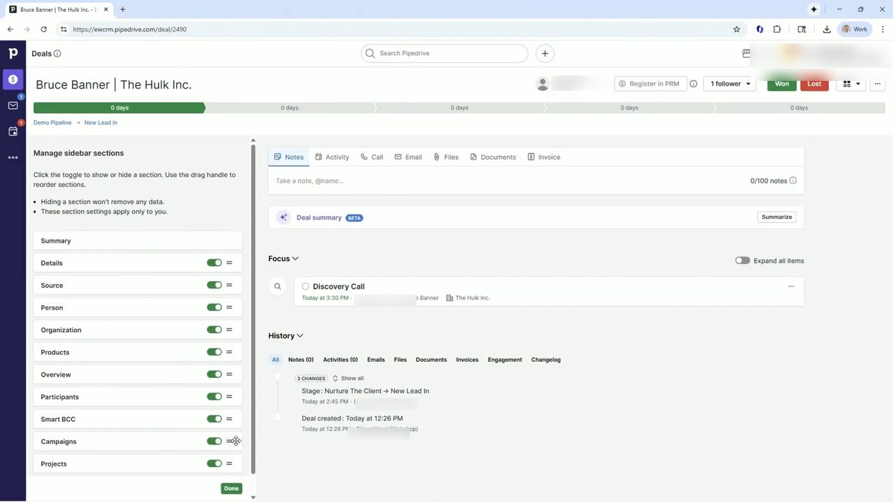 Pipedrive deal detail page for Bruce Banner The Hulk Inc. on the Demo Pipeline > New Lead In stage, with the Manage sidebar sections panel open on the left. The panel toggle list shows Summary, Details, Source, Person, Organization, Products, Overview, Participants, Smart BCC, Campaigns, Projects, all enabled with drag handles. Right pane has activity tabs (Notes, Activity, Call, Email, Files, Documents, Invoice), a 0/100 notes counter, a Deal summary BETA card with Summarize button, and a Focus list showing Discovery Call today at 3:30 PM. History feed below shows 3 CHANGES (stage moved Nurture The Client to New Lead In) and Deal created today at 12:26 PM. Won/Lost buttons sit top-right.